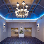 Large chandelier in the entrance foyer to The Lakeside Suite at mercure gloucester bowden hall hotel