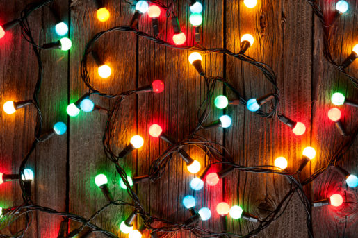 Christmas colorful lights on wooden table